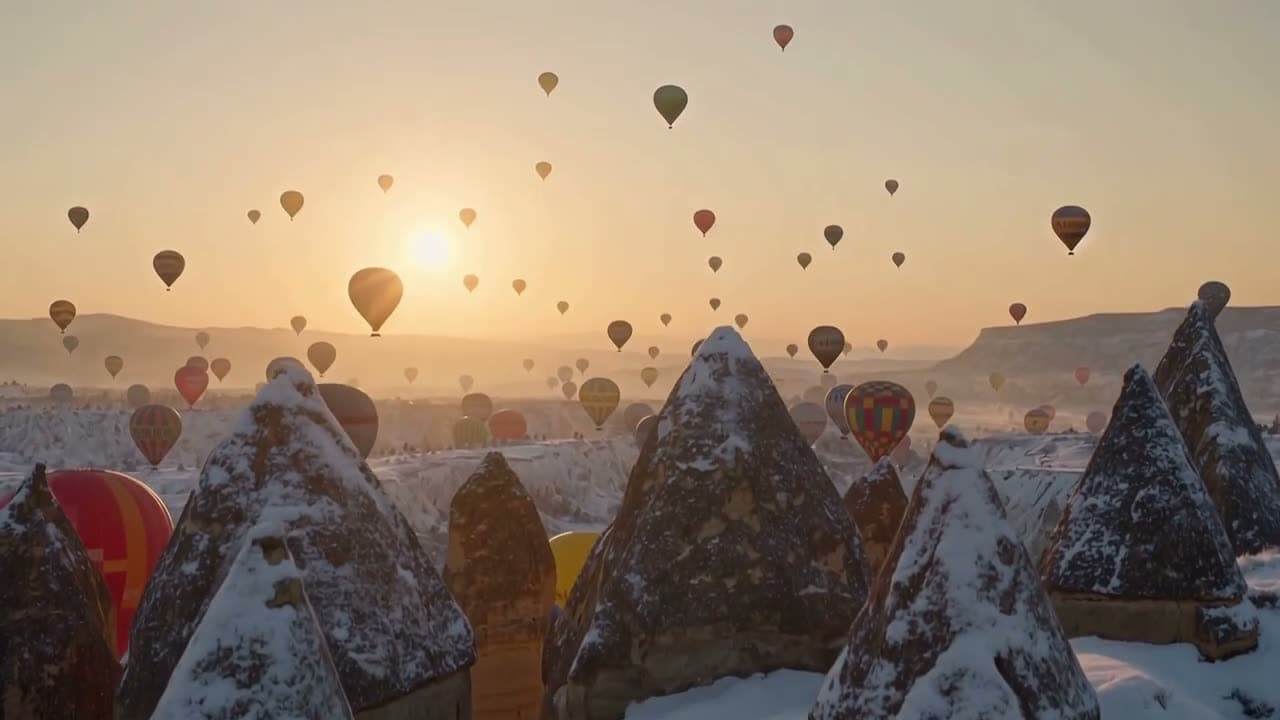 We turned the Cappadocia video into winter: the fairy chimneys and the valley are covered in snow, and the… Still from a video made with Kling 4.0 Video Edit.
