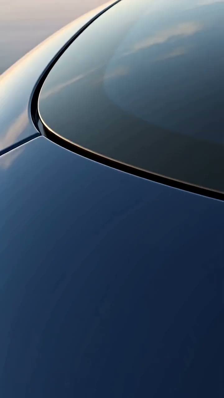 Water beading on a freshly washed car, reflections sliding across the paint. Still from a video made with Seedance 2.0.